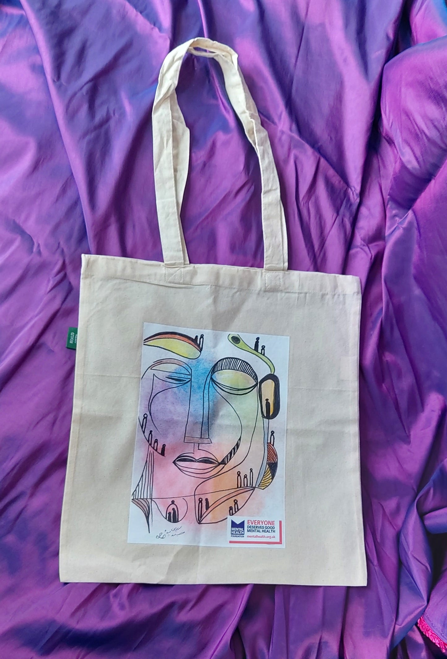 Tote bag designed by participants from our Refugee Programme