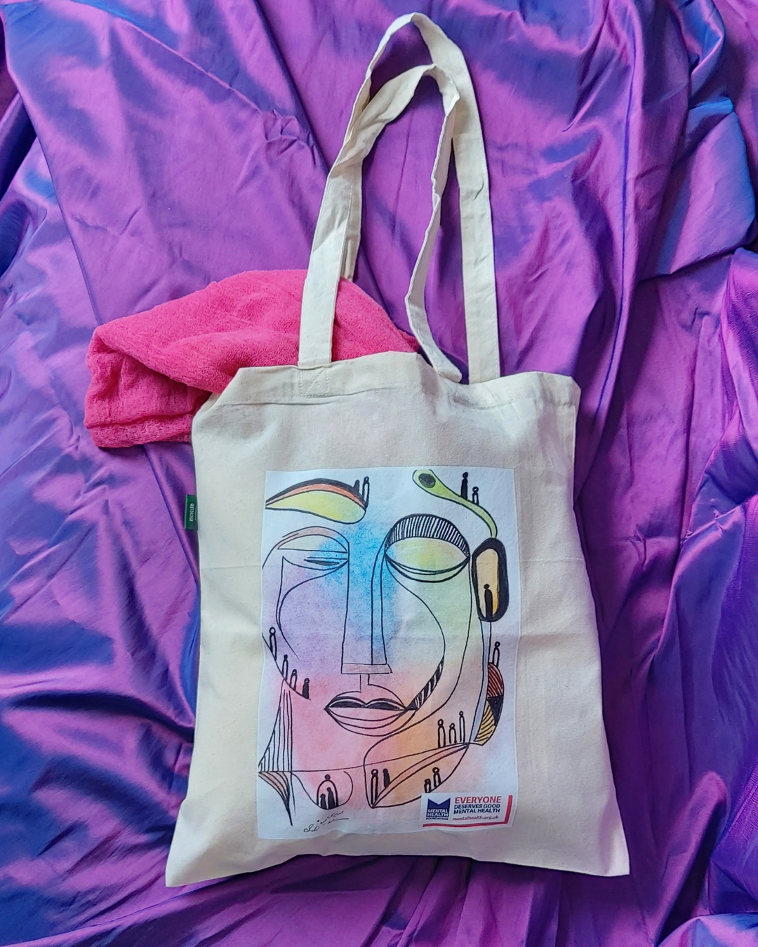 Tote bag designed by participants from our Refugee Programme